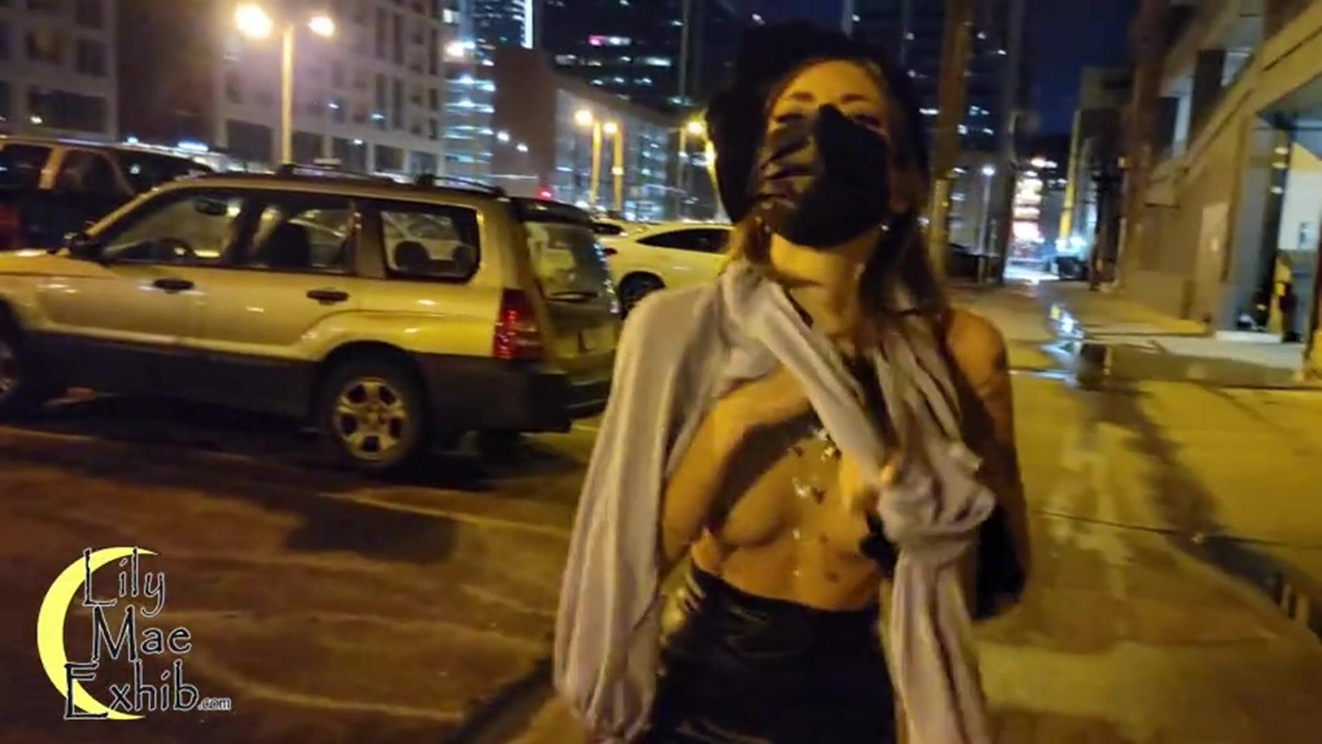 clothes off on the middle of downtown