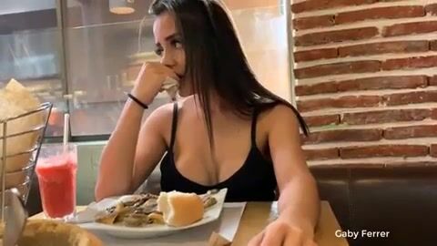 Struggling not to moan in public while her friend controls the vibe.