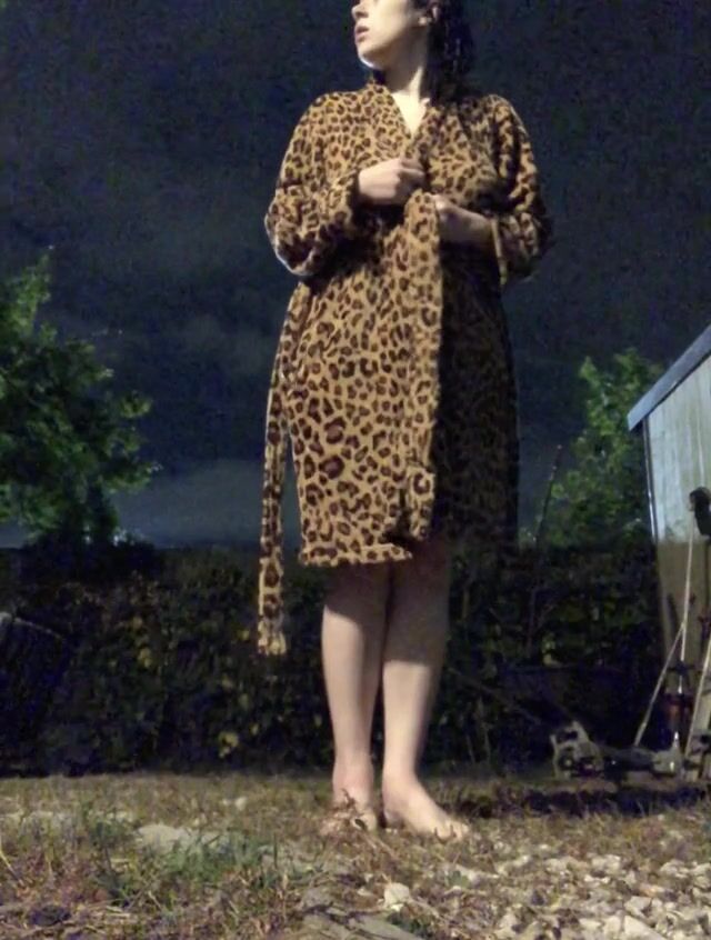 Stripping nude in my apartment backyard. There’s a parking lot light that makes it so bright!