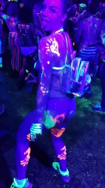 Wearing nothing but UV paint!