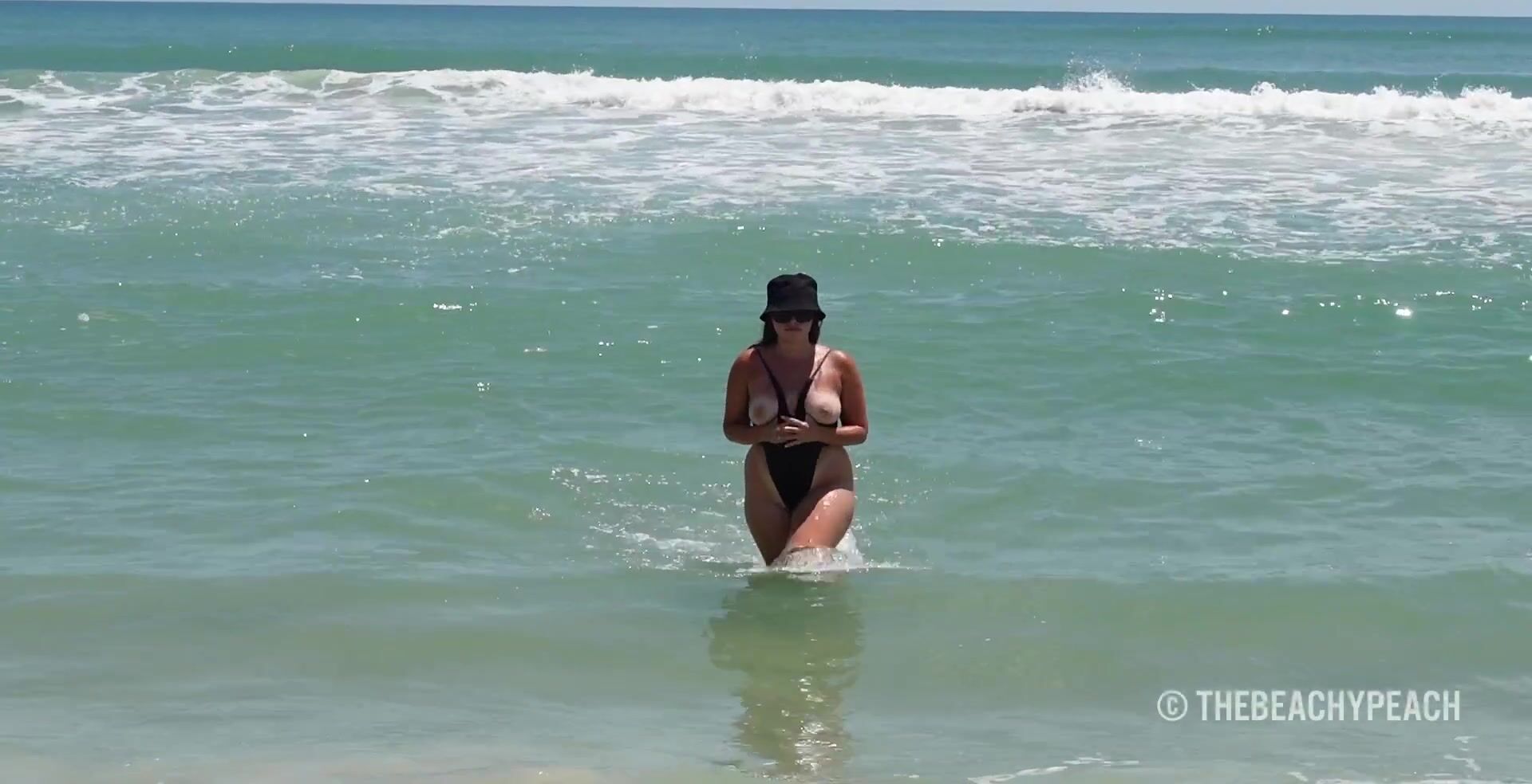 Showing off my new one piece at the beach