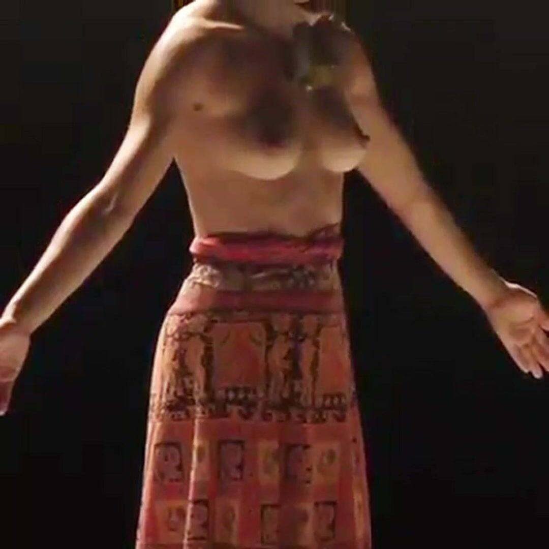 Portuguese performer Maria Fonseca topless on stage