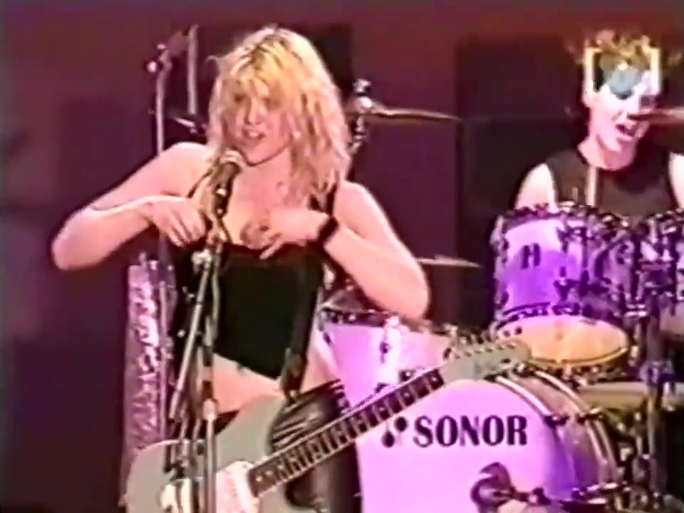 Courtney Love rocking out with her tits out