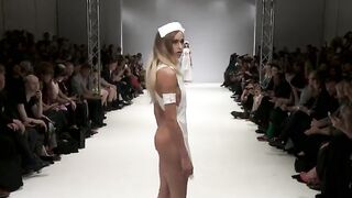 Wearing just an apron on runway