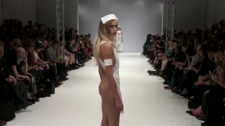 Wearing just an apron on runway