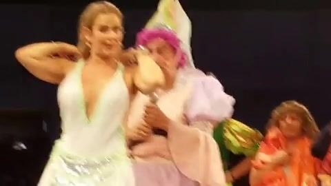 Showing her boobs during a play