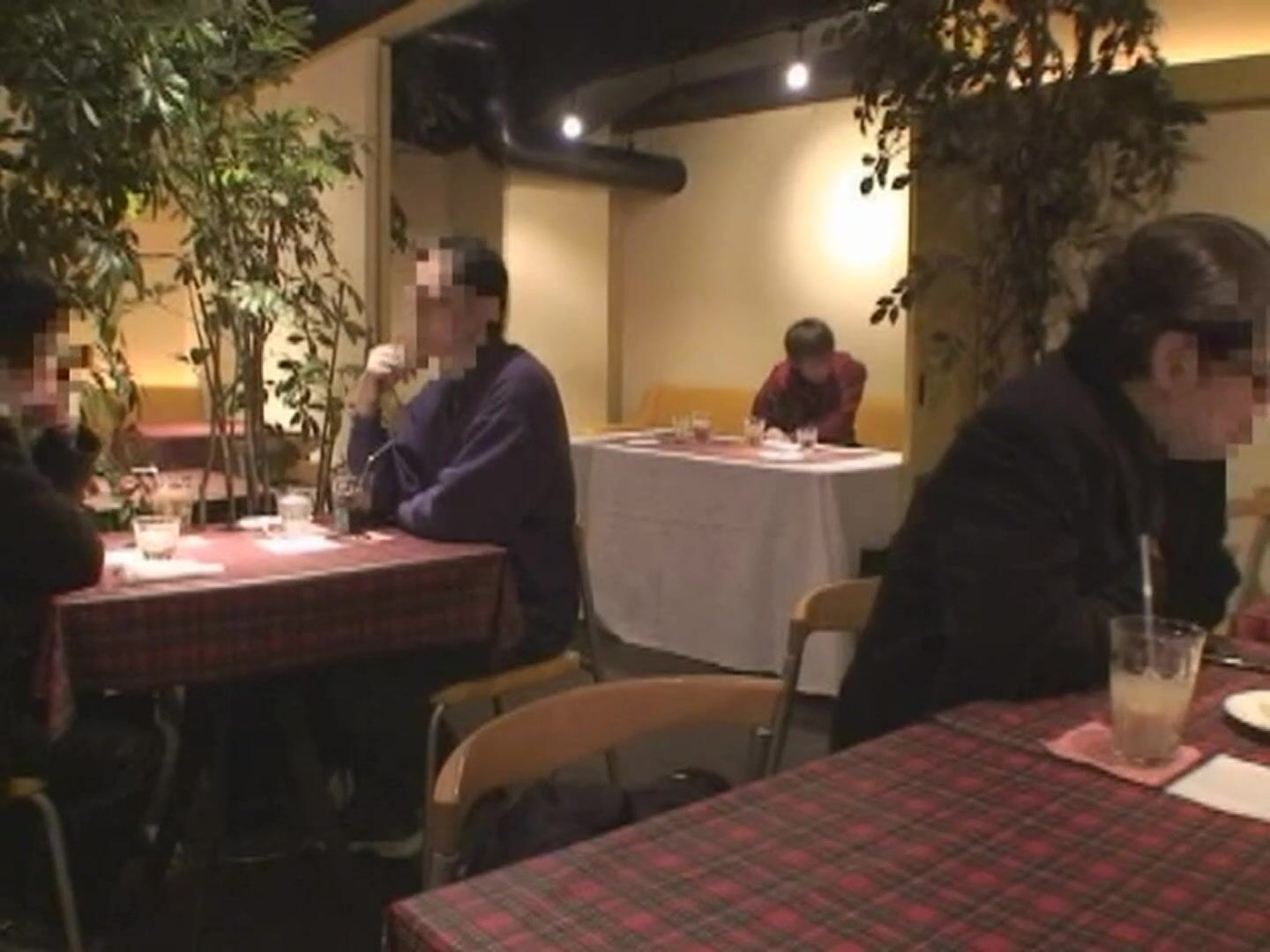 Having sex under a restaurant table